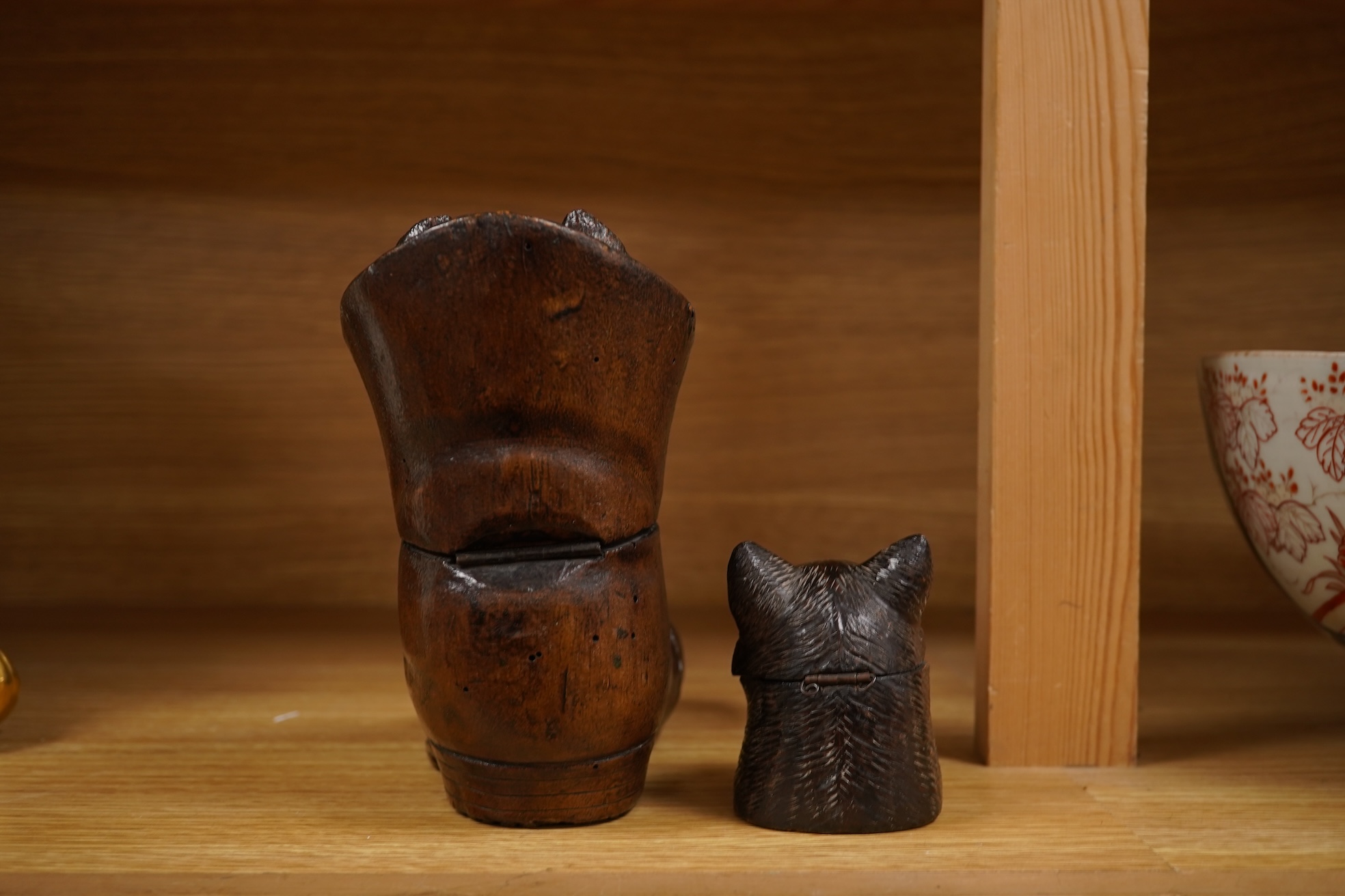A Black Forest carving of a kitten in a boot inkwell and another car inkwell, tallest 15cm